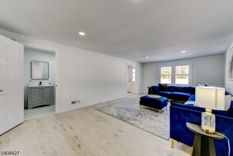 22 Glen Road Bridgewater, NJ 08805 - Photo 7 of 48 a living room with furniture and a window