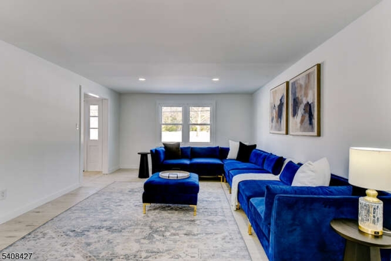 22 Glen Road Bridgewater, NJ 08805 - Photo 8 of 48 a living room with furniture and a window