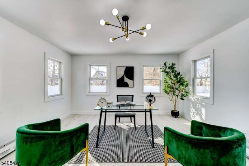 22 Glen Road Bridgewater, NJ 08805 - Photo 10 of 48 a living room with furniture and a wooden floor