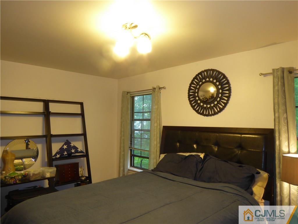 803 Maplecrest Road Edison, NJ 08820 - Photo 3 of 6 a living room with furniture