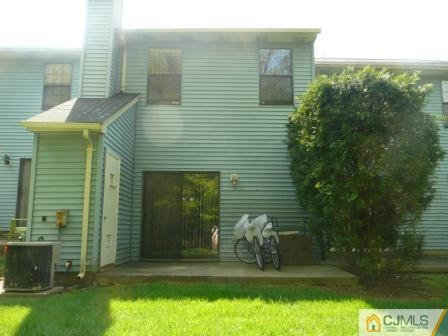 803 Maplecrest Road Edison, NJ 08820 - Photo 4 of 6 a front view of a house with a yard