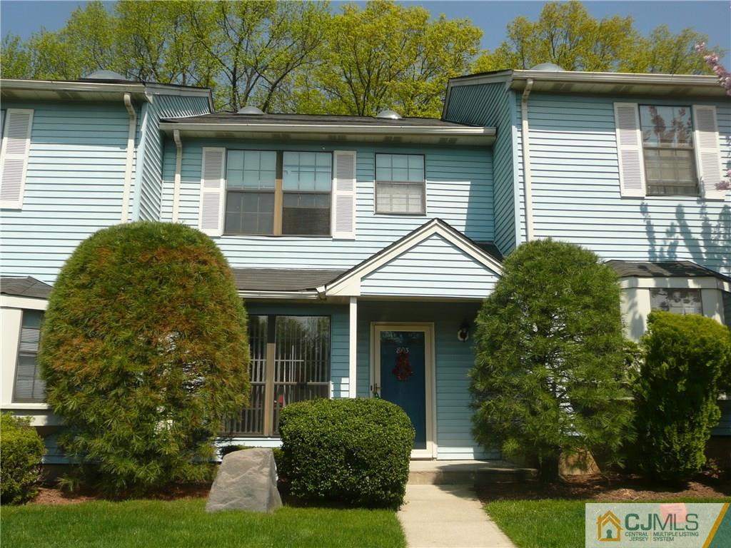 803 Maplecrest Road Edison, NJ 08820 - Photo 6 of 6 a front view of a house with garden