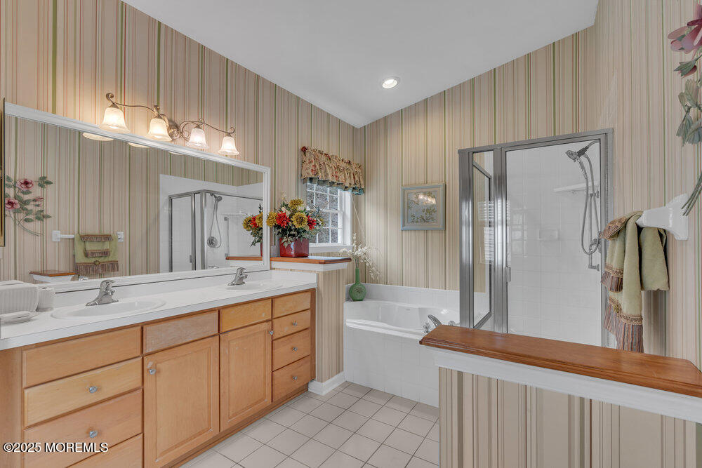 93 Pebble Beach Boulevard Jackson, NJ 08527 - Photo 18 of 47 a spacious bathroom with a double vanity sink a mirror and a shower