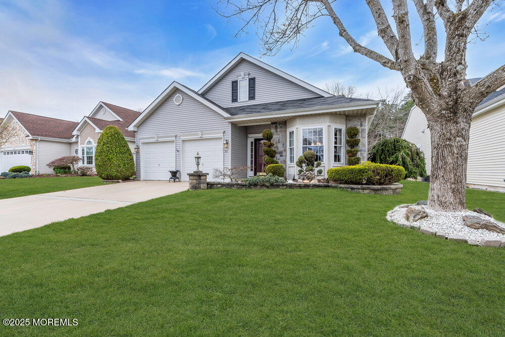 93 Pebble Beach Boulevard Jackson, NJ 08527 - Photo 2 of 47 a front view of house with yard and green space