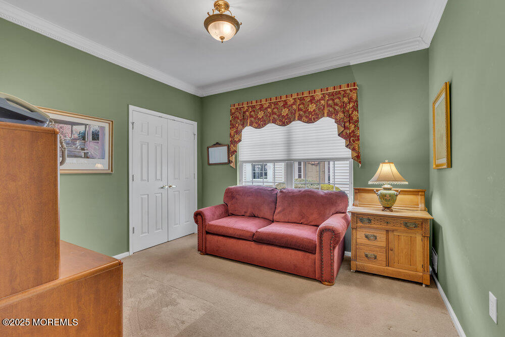 93 Pebble Beach Boulevard Jackson, NJ 08527 - Photo 21 of 47 a bedroom with a bed and a dresser