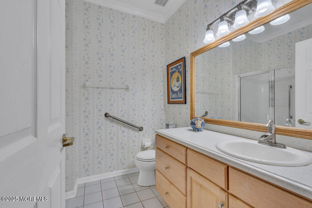93 Pebble Beach Boulevard Jackson, NJ 08527 - Photo 23 of 47 a bathroom with a sink a toilet and shower