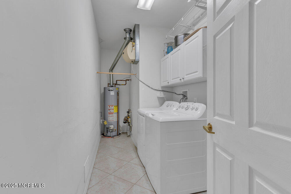 93 Pebble Beach Boulevard Jackson, NJ 08527 - Photo 24 of 47 a bathroom with a sink and mirror