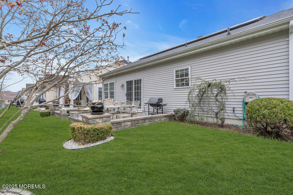 93 Pebble Beach Boulevard Jackson, NJ 08527 - Photo 29 of 47 a view of a backyard with sitting area