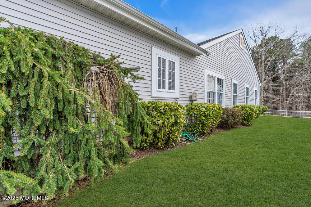 93 Pebble Beach Boulevard Jackson, NJ 08527 - Photo 31 of 47 a view of a backyard with plants