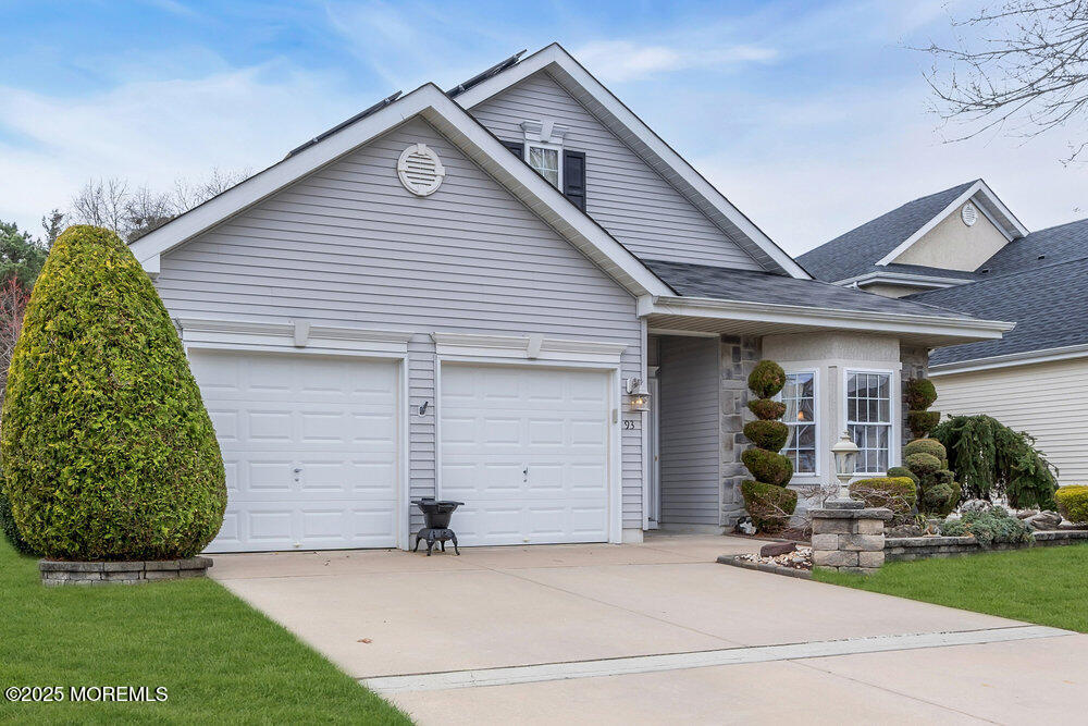 93 Pebble Beach Boulevard Jackson, NJ 08527 - Photo 4 of 47 a view of a house with a yard and potted plants