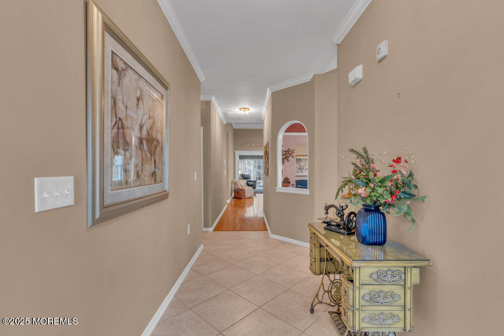 93 Pebble Beach Boulevard Jackson, NJ 08527 - Photo 5 of 47 a living room with furniture and flowers
