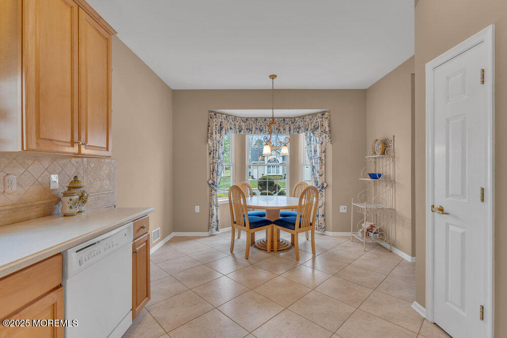 93 Pebble Beach Boulevard Jackson, NJ 08527 - Photo 8 of 47 a dining room with furniture and window