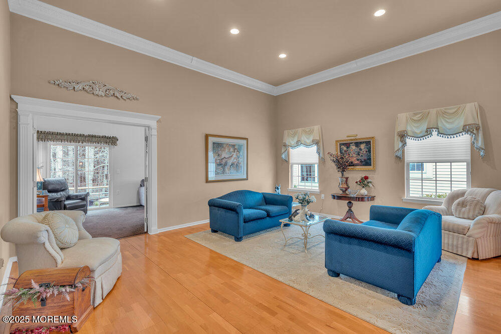93 Pebble Beach Boulevard Jackson, NJ 08527 - Photo 9 of 47 a living room with furniture or couch and a window