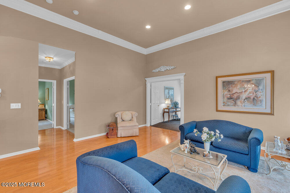 93 Pebble Beach Boulevard Jackson, NJ 08527 - Photo 10 of 47 a living room with furniture and wooden floor