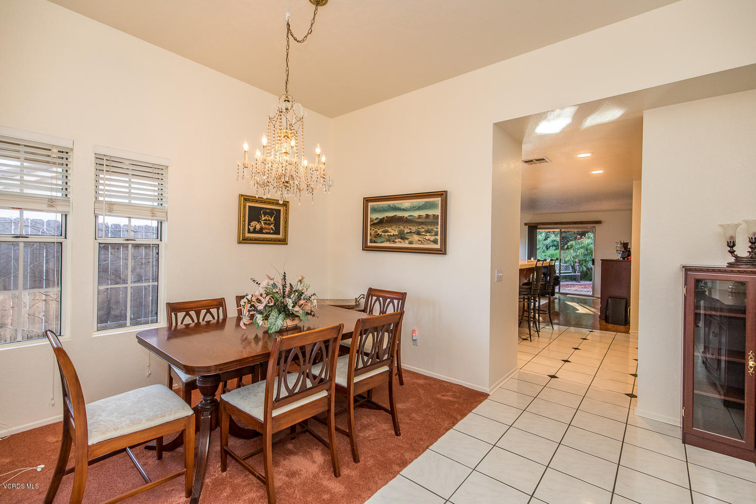 2073 Old Ranch Road Camarillo, CA 93012 - Photo 30 of 47 a view of a dining room with furniture and chandelier
