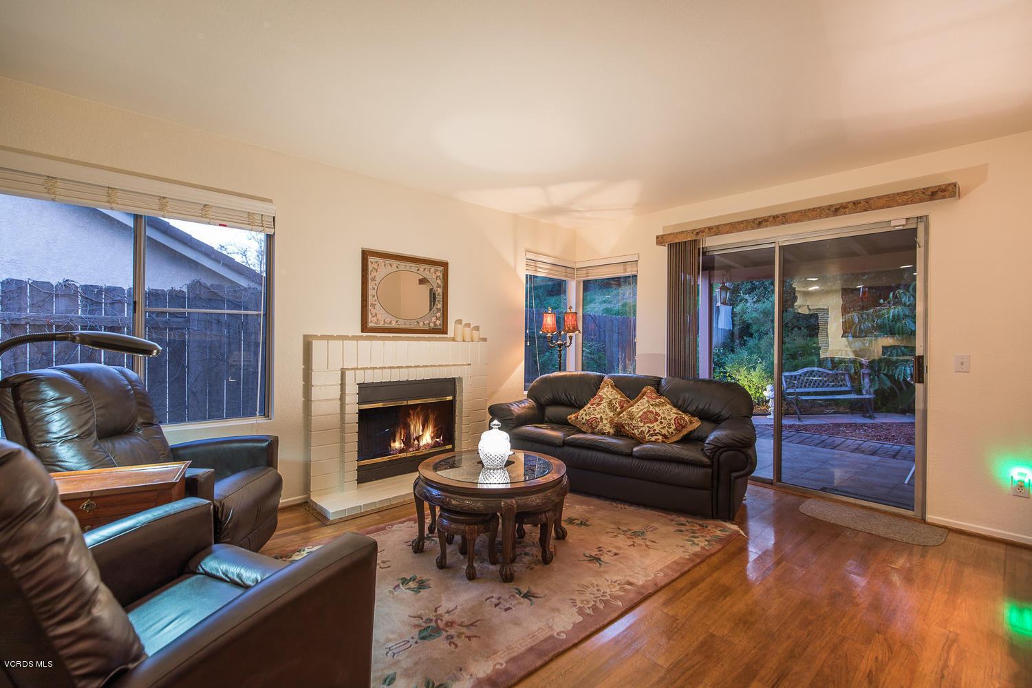 2073 Old Ranch Road Camarillo, CA 93012 - Photo 43 of 47 a living room with furniture and a fireplace