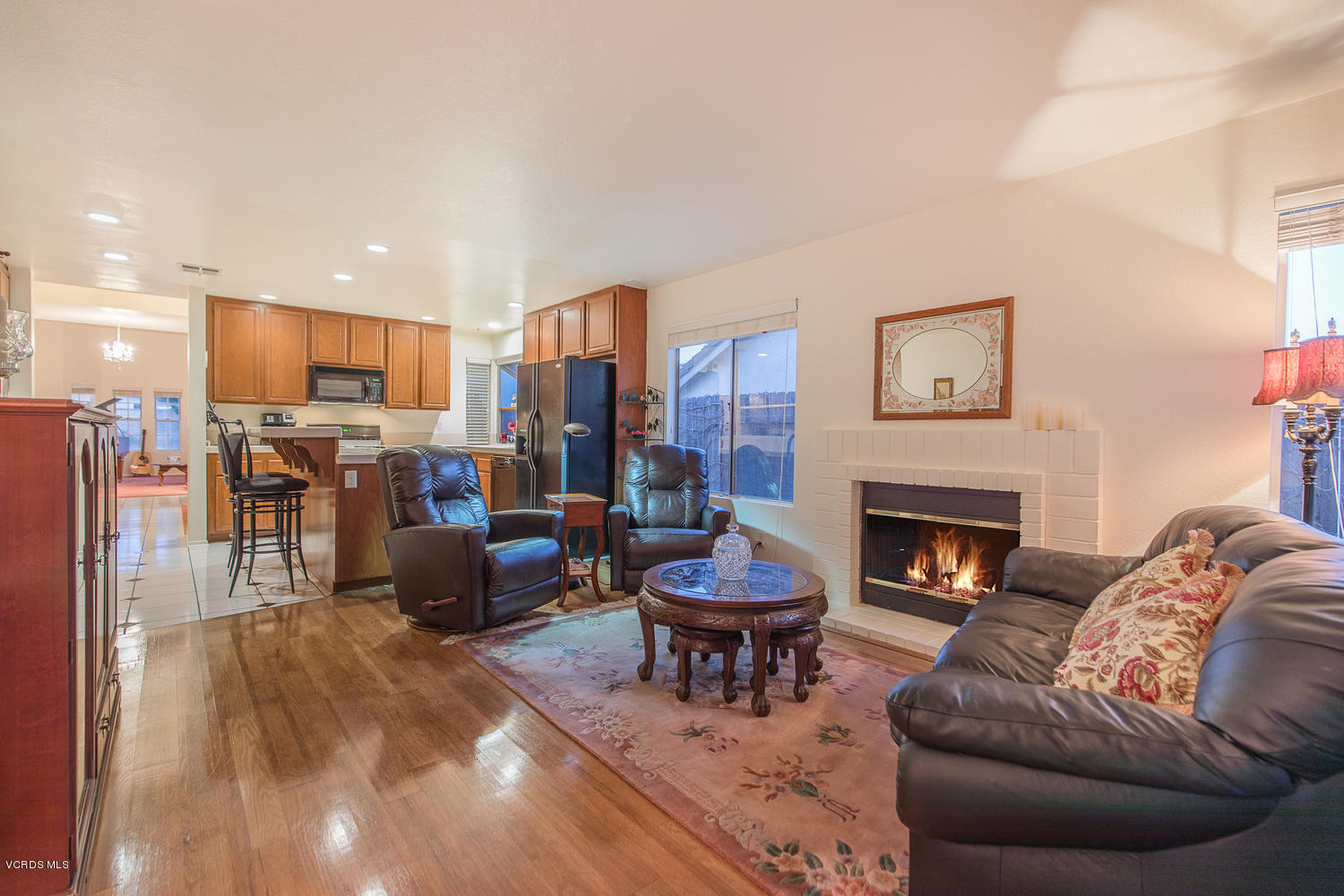 2073 Old Ranch Road Camarillo, CA 93012 - Photo 44 of 47 a living room with furniture and a fireplace