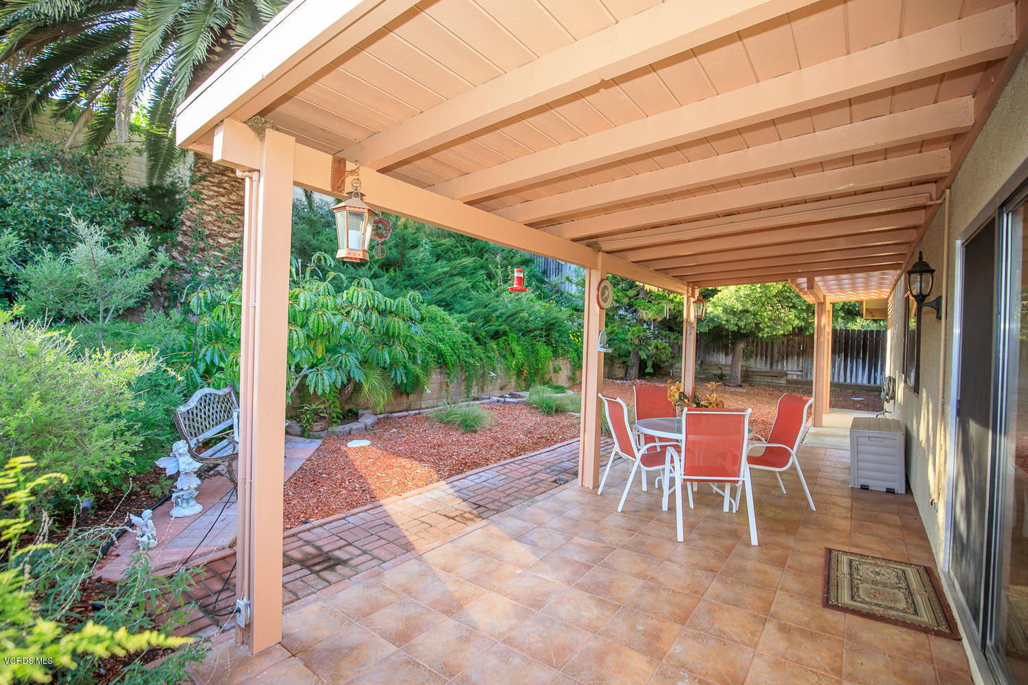 2073 Old Ranch Road Camarillo, CA 93012 - Photo 6 of 47 a patio with yard glass top table and chairs