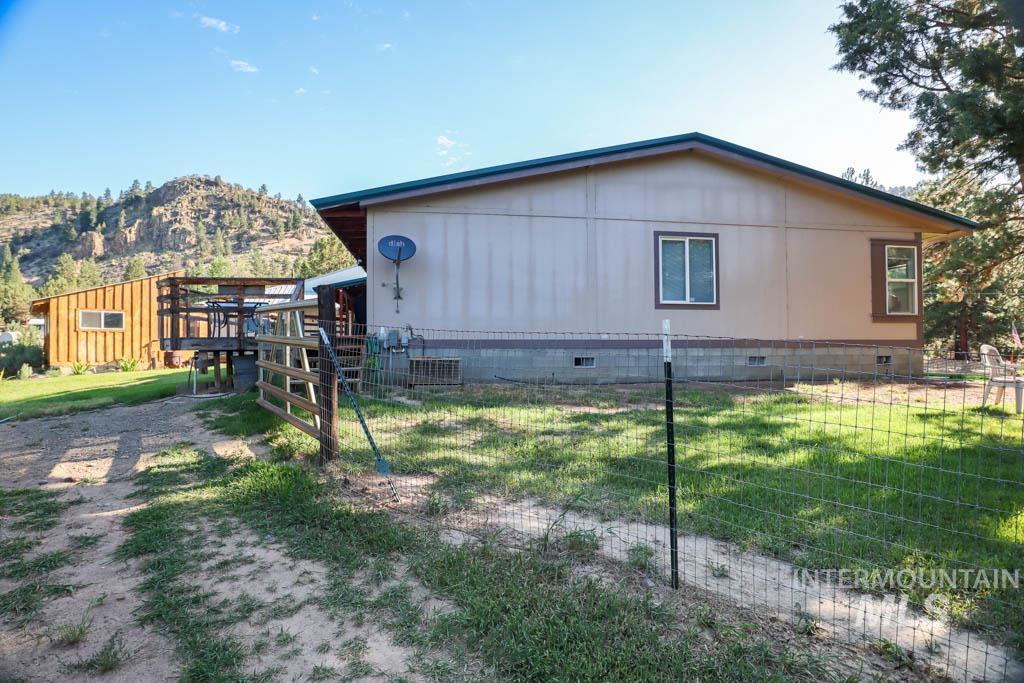 32290 Rice Road Unity, OR 97884 - Photo 38 of 45 View of side of home featuring crawl space and a mountain view