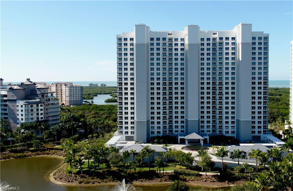 13915 Old Coast Road, Unit 602 Naples, FL 34110 - Photo 20 of 25 a view of a city with tall buildings