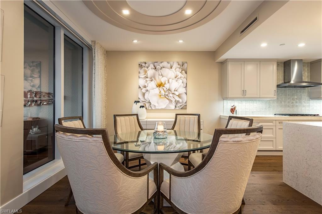 13915 Old Coast Road, Unit 602 Naples, FL 34110 - Photo 6 of 25 a dining room with furniture and window