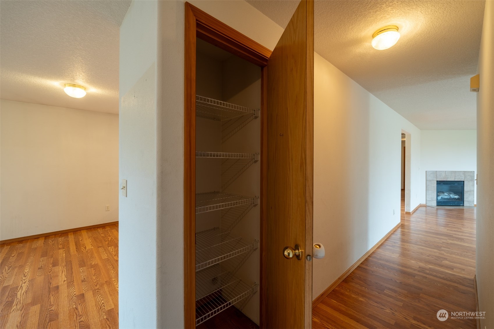 444 Bond Road Castle Rock, WA 98611 - Photo 17 of 40 a view of a hallway with wooden floor and staircase