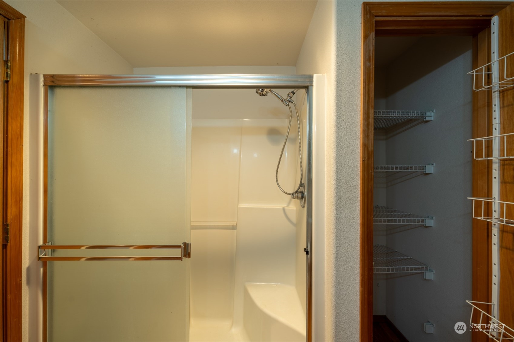 444 Bond Road Castle Rock, WA 98611 - Photo 26 of 40 a bathroom with a glass shower door