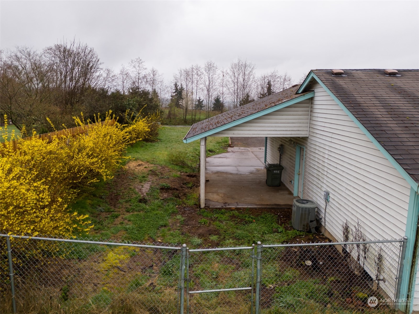 444 Bond Road Castle Rock, WA 98611 - Photo 37 of 40 a backyard of a house with lots of green space