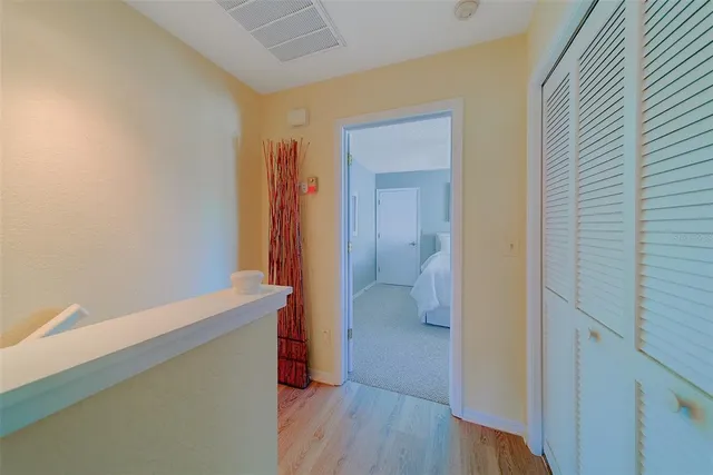 a view of a balcony with chairs