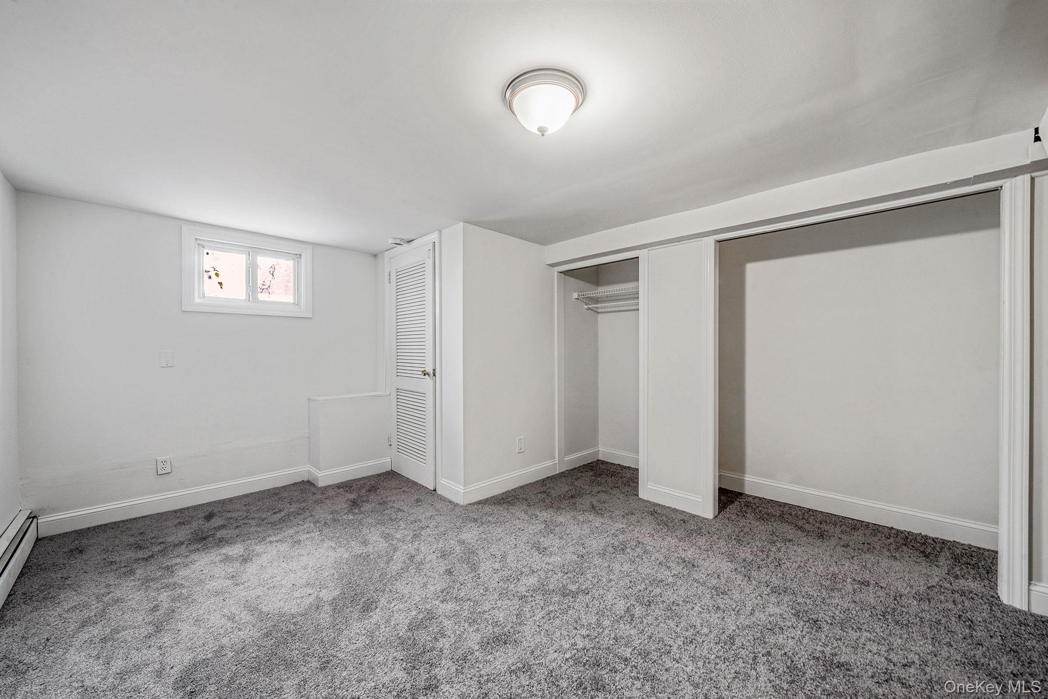 286 Old Country Road Deer Park, NY 11729 - Photo 30 of 33 a view of an empty room and window
