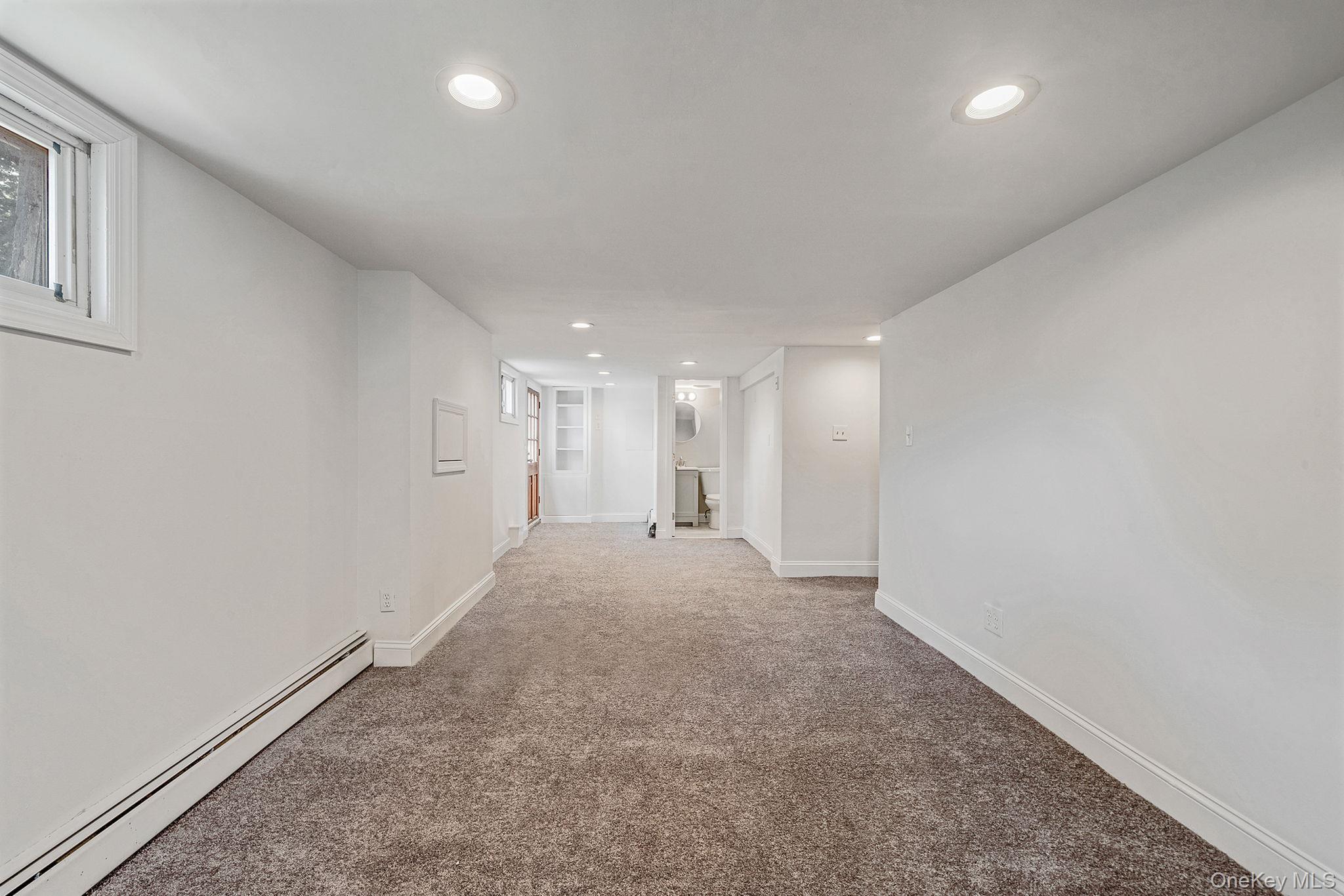 286 Old Country Road Deer Park, NY 11729 - Photo 33 of 33 a view of hallway with a window