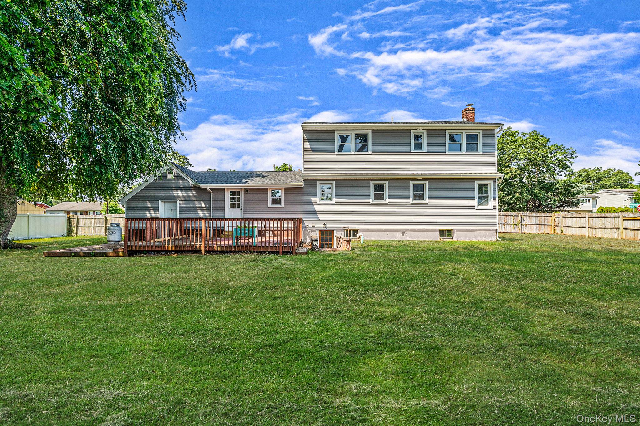 286 Old Country Road Deer Park, NY 11729 - Photo 4 of 33 a view of house with yard and entertaining space