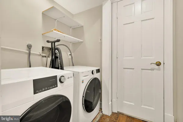 a utility room with dryer and washer