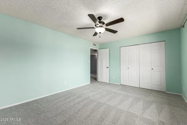 a bathroom with a double vanity sink toilet mirror and bathtub