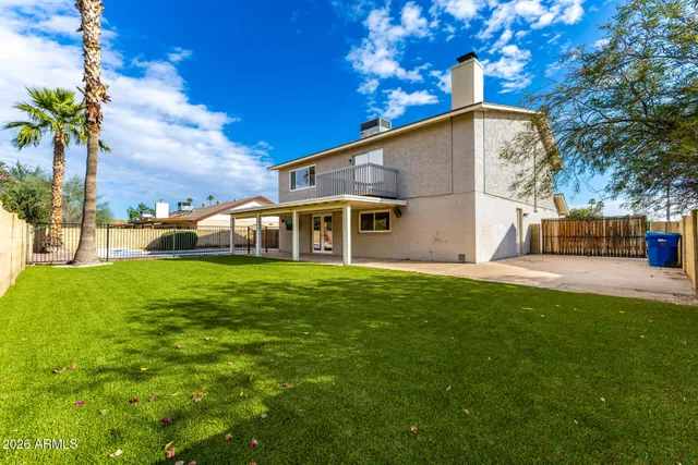 a front view of a house with swimming pool