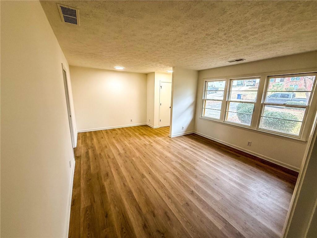 6485 Carolyn Court Rex, GA 30273 - Photo 2 of 12 a view of an empty room and window