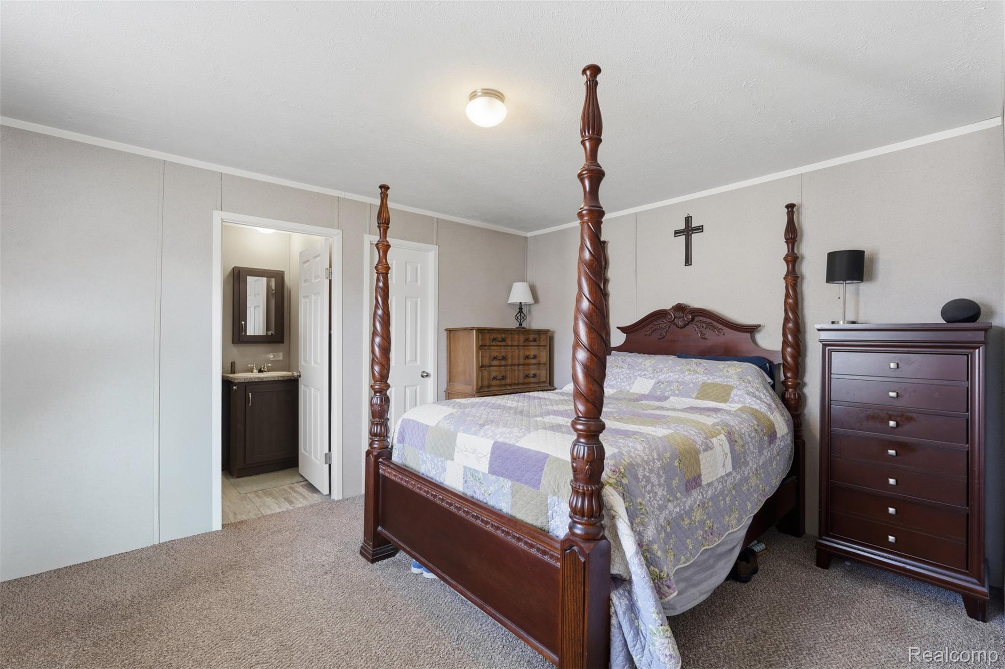 92 Normandy Drive Howell, MI 48843 - Photo 11 of 24 Carpeted room with light neutral walls and white trim