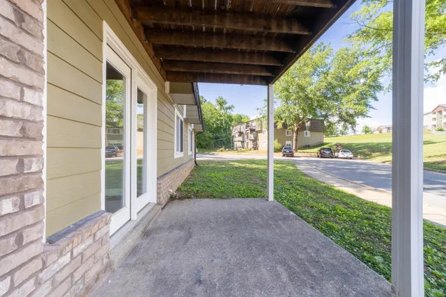 a view of a porch with garden