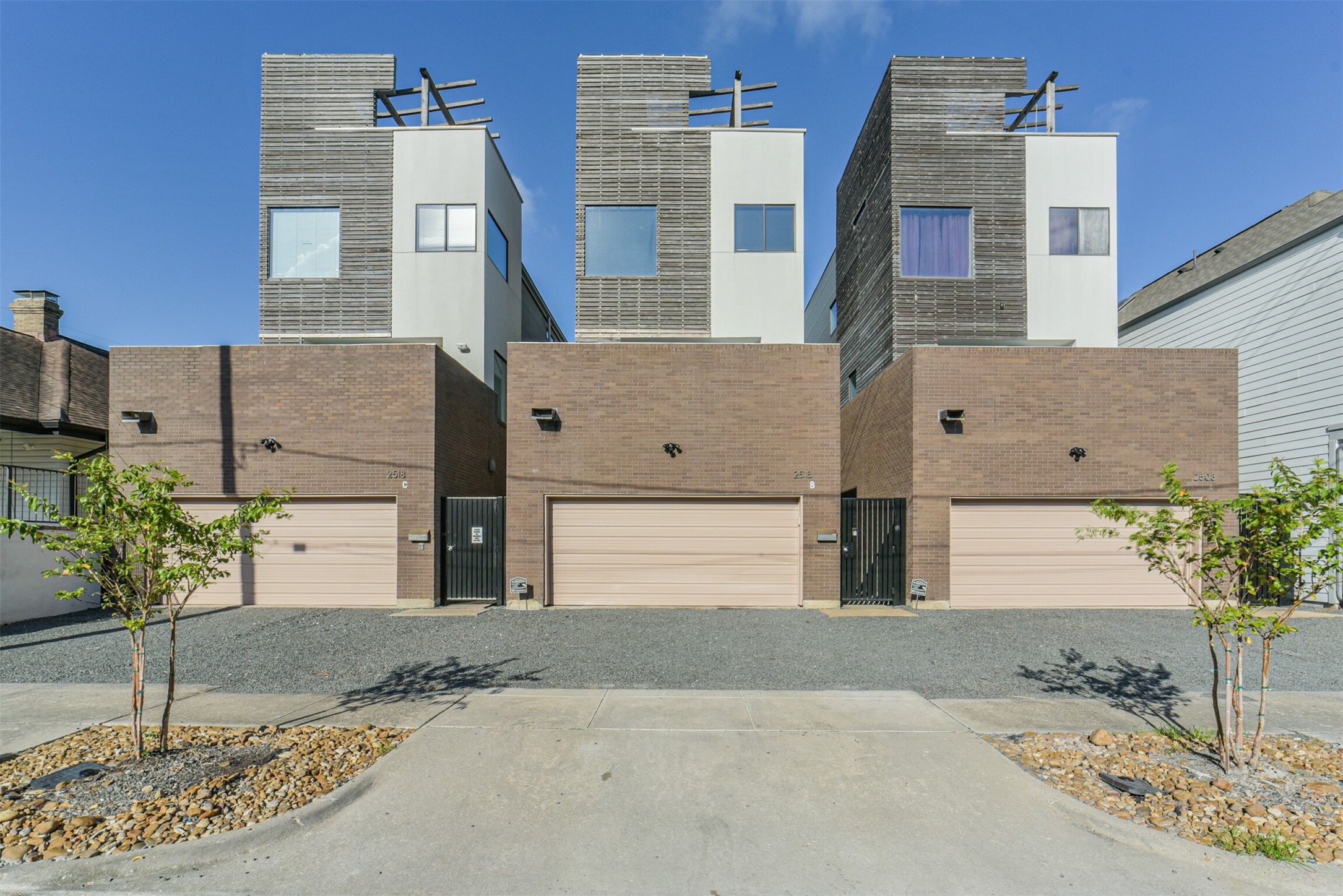 2518 Mason Street, Unit B Houston, TX 77006 - Photo 1 of 40 a front view of a building with potted plants