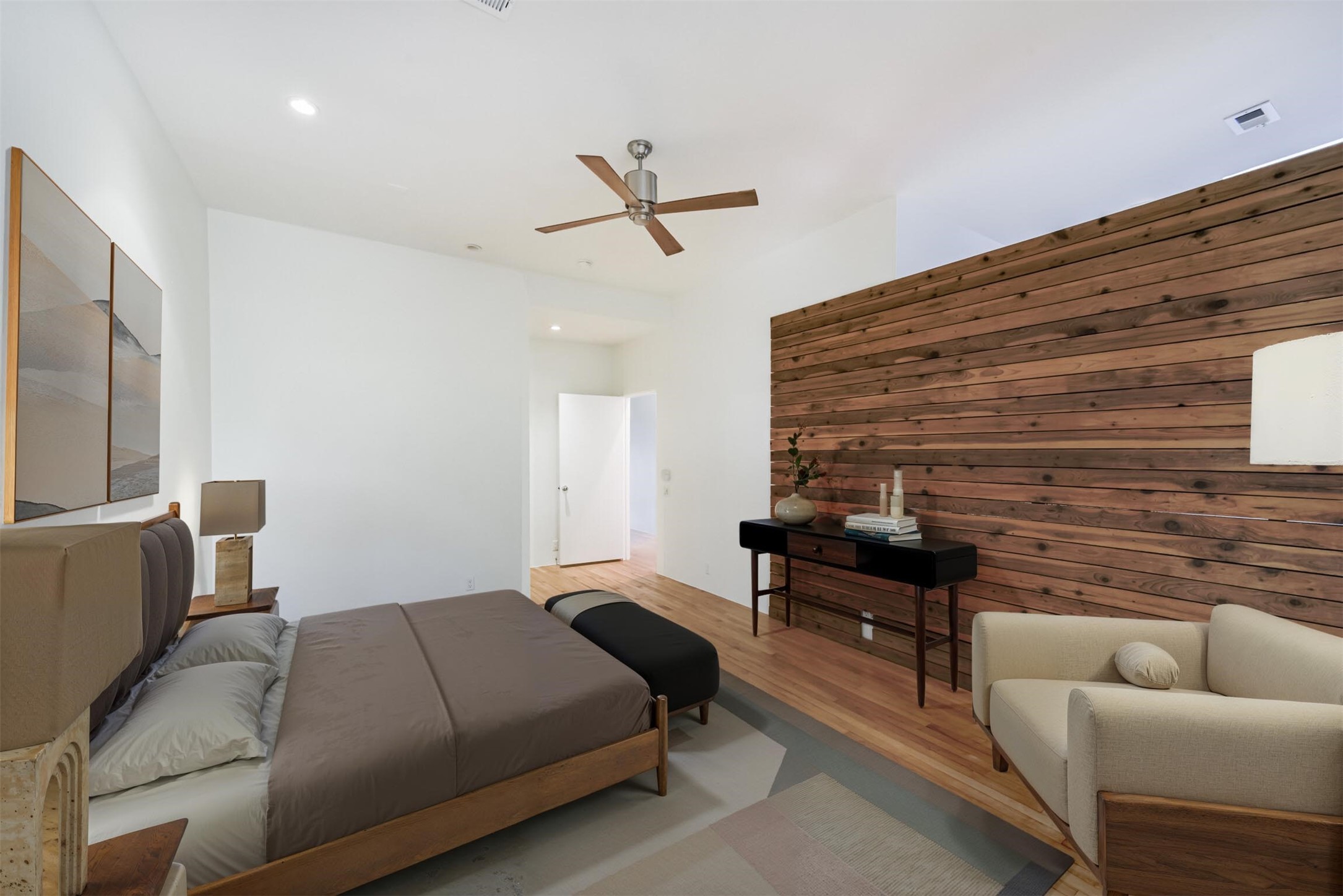 2518 Mason Street, Unit B Houston, TX 77006 - Photo 16 of 40 a bedroom with a bed and furniture