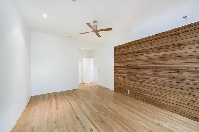 a bedroom with a bed and furniture