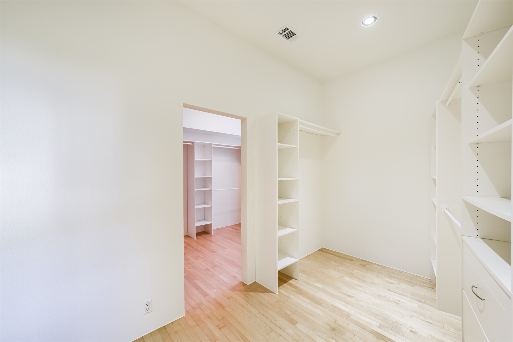 2518 Mason Street, Unit B Houston, TX 77006 - Photo 19 of 40 an empty room with wooden floor and windows