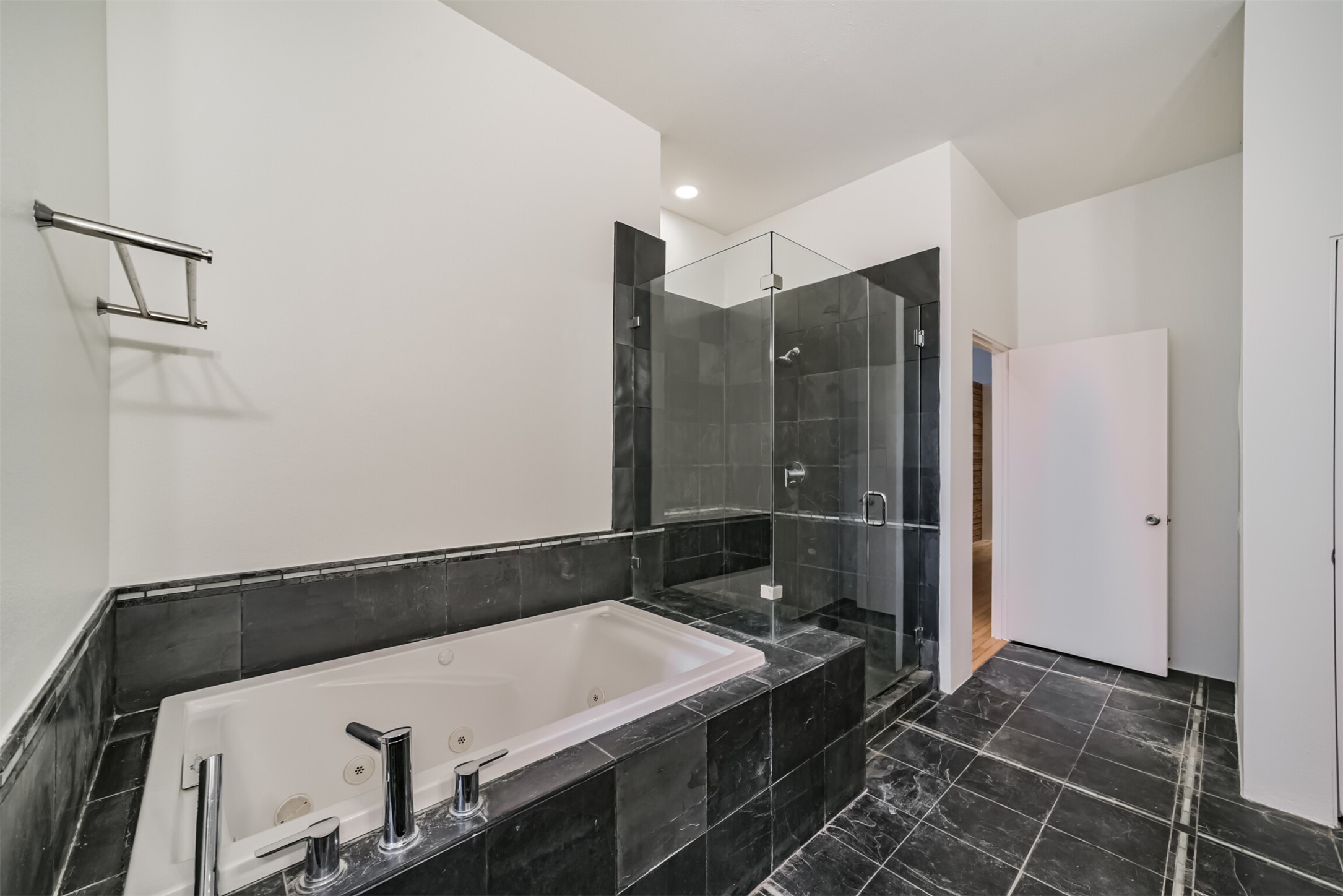 2518 Mason Street, Unit B Houston, TX 77006 - Photo 23 of 40 a bathroom with a bathtub and a shower