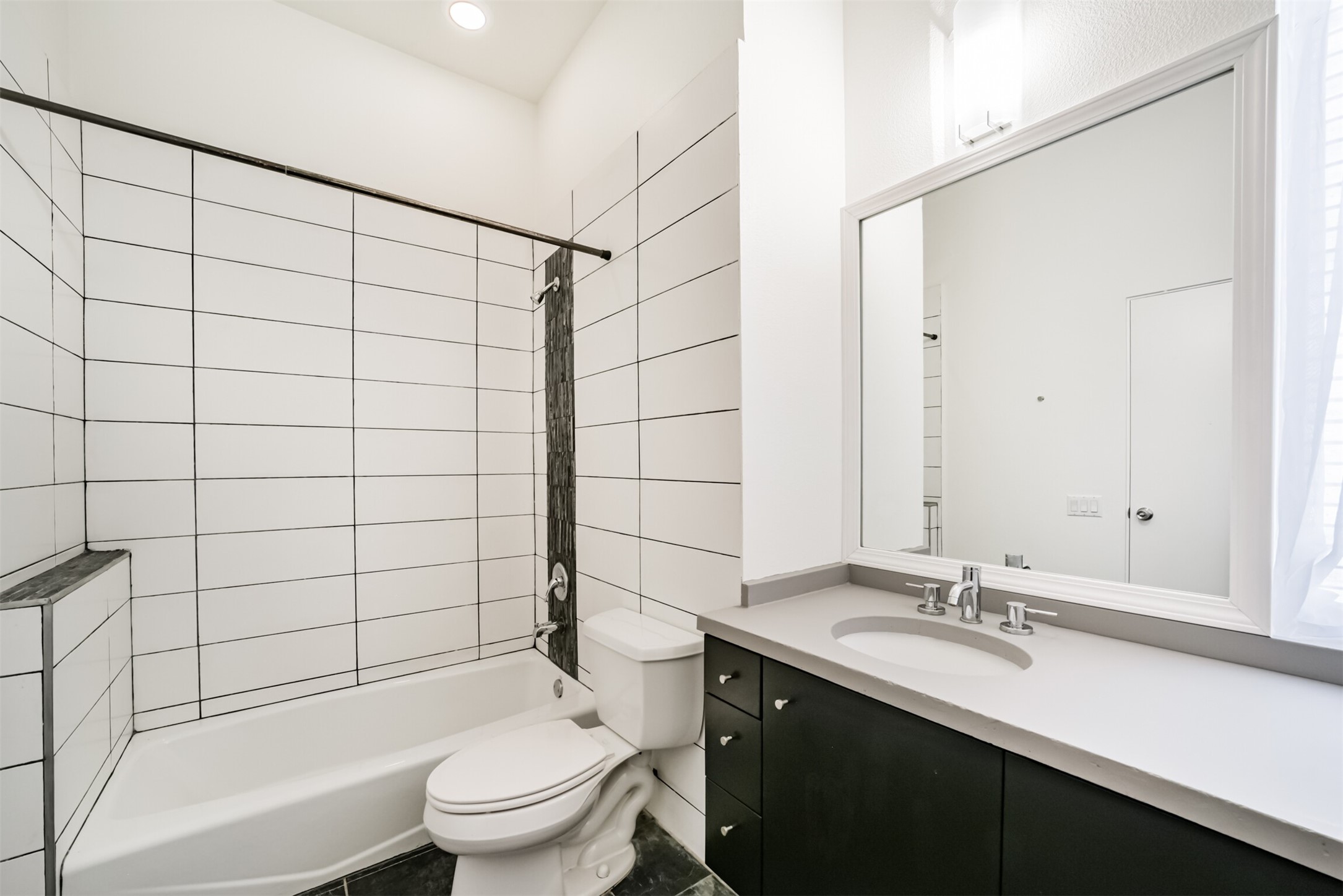 2518 Mason Street, Unit B Houston, TX 77006 - Photo 29 of 40 a bathroom with a sink a toilet and shower