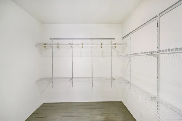 a view of an empty walk in closet