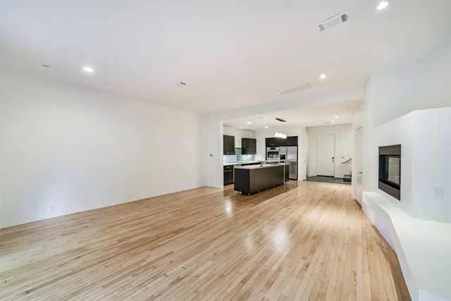 a view of a kitchen with microwave and stove