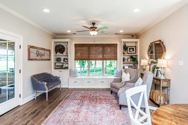 a living room with furniture and a window