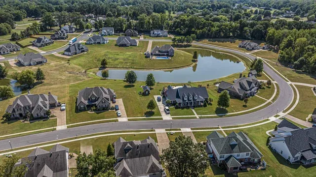 a view of swimming pool with seating space