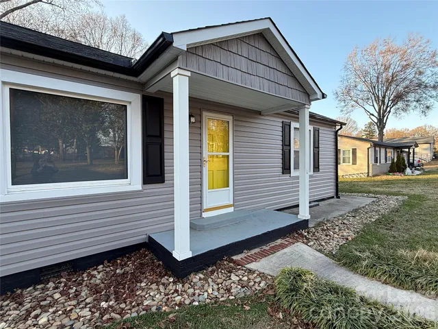a view of a house with a small porch