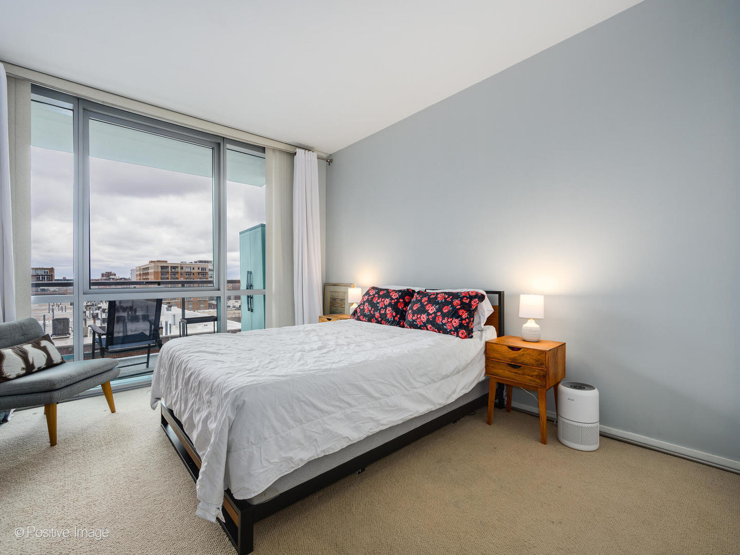 123 South Green Street, Unit 710B Chicago, IL 60607 - Photo 13 of 17 a bedroom with a bed and a large window